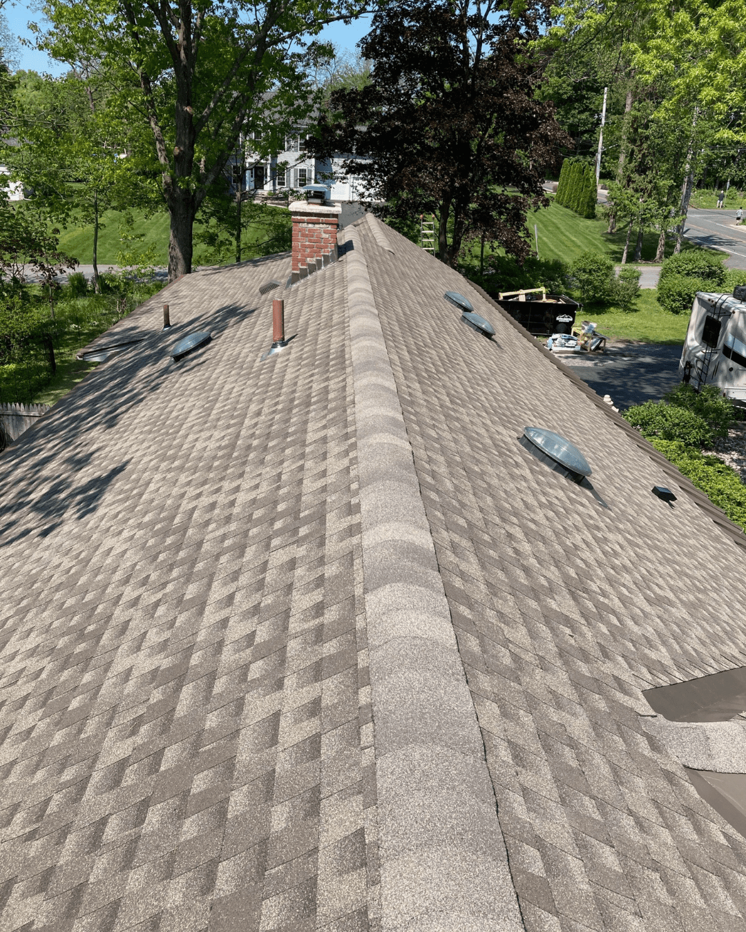 View from a roof with new asphalt shingles