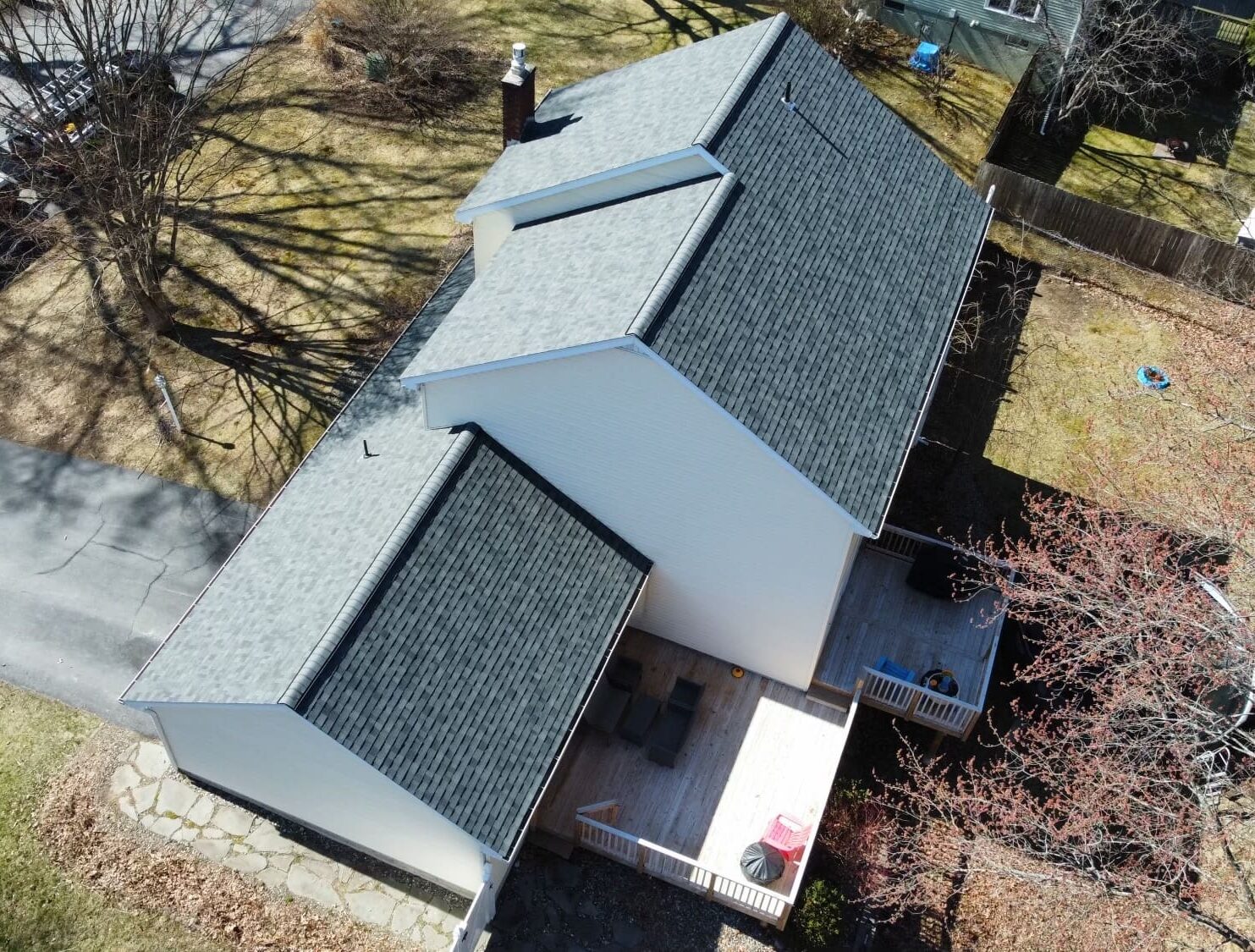 Aerial view of a completed roof replacement with Owens Corning Estate Gray asphalt shingles