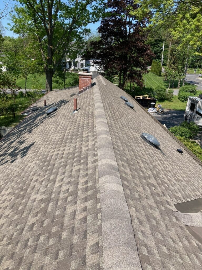 residential roof with gray asphalt shingles
