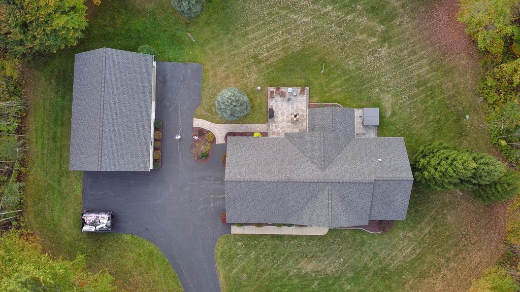 Home with roof replacement completed by KC Entities Roofing and Siding with Owens Corning Williamsburg Gray asphalt shingles